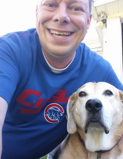 Lucy the beagle mix with her human, Mark