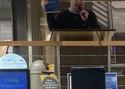 Mark introducing Lucy's Way at Kokomo-Howard County Public Library author fair on November, 7, 2025.