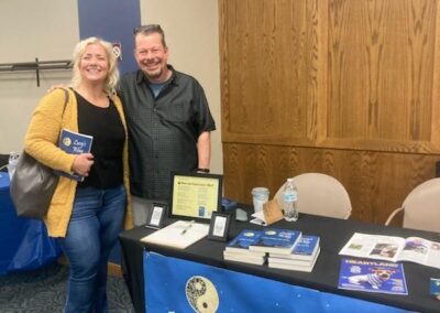 Mark with longtime friend Jane Tucker at Marion Public Library Harvesting Our Stories inaugural author fair on November 15, 2025.