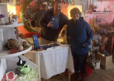 The two family authors. Mark and his cousin, Kathy Chedwyk, who wrote more than a dozen books as an author, at Soul Weaver Alchemy on Dec. 6, 2025.