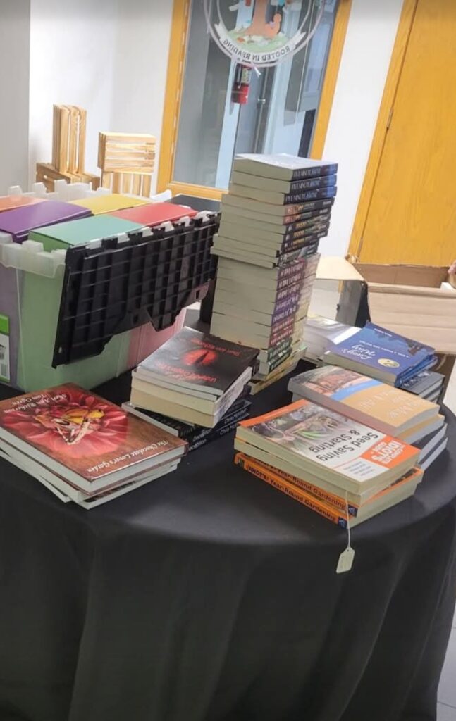 I spy with my eye copies of Lucy's Way in this pile of works of local authors ready for display at Bookworm Orchard. Photo courtesy of J.J. Devine and Bookworm Orchard.