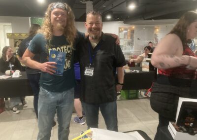 Mark with newest Lucy's Way fan Austin, who is also a Tao Te Ching enthusiast, at Bookworm Orchard's grand opening author signing event on April 25, 2026.