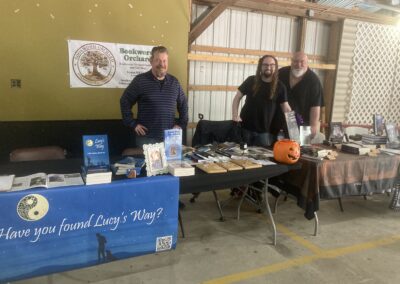 Mark with authors Connor Landon Freeman, center, and Bob Freeman representing Bookworm Orchard at May 23, 2026 Summerween event at Cass County Fairgrounds in Logansport, IN.