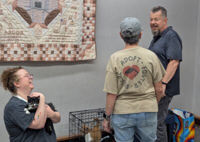 Mark meets Thug, Tug, Diego and Bentley ahead of his reading at Elwood Public Library on August 8, 2026.