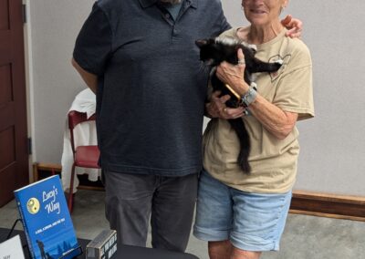 Mark with Vicki Savage from Elwood Animal Shelter and Bentley on August 8, 2026.