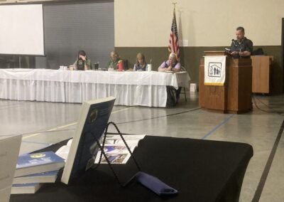 Mark reads from Lucy's Way: A Dog, A Drunk, and The Tao at the Indiana Extension Homemakers Association fall district event. Mark donated $160 of proceeds from Lucy's Way sales at the event back to IEHA. IEHA then donated that back toward rehabilitation services in Grant County.